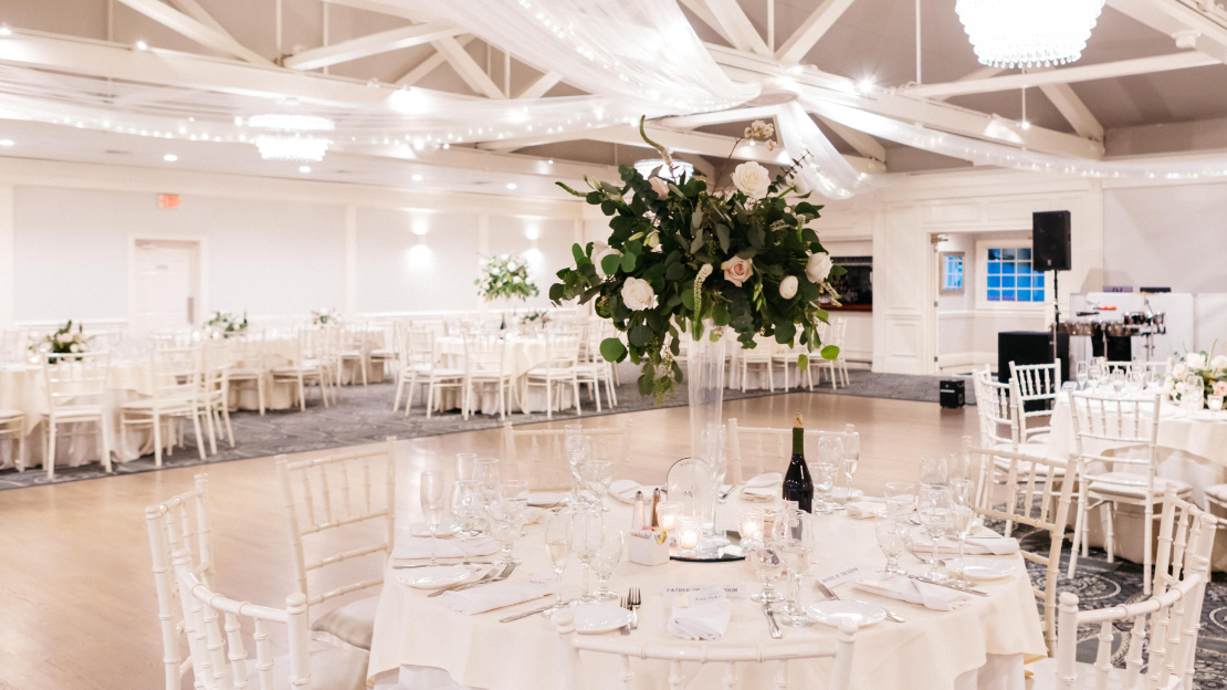 Guests celebrating on the dance floor at a wedding reception at Amarante’s Sea Cliff