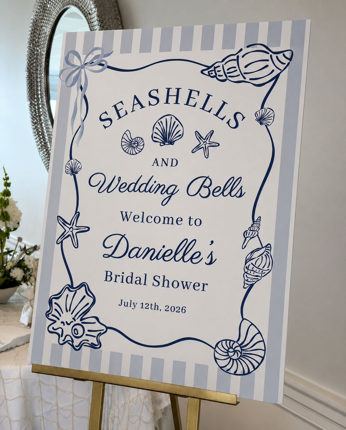 Seashell-themed welcome sign for Danielle’s bridal shower at Amarante’s Sea Cliff.