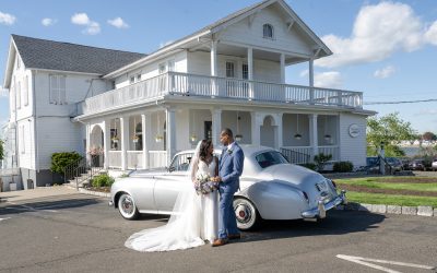 Bride and groom arriving at The Inn at Amarante's Sea Cliff before their waterfront wedding